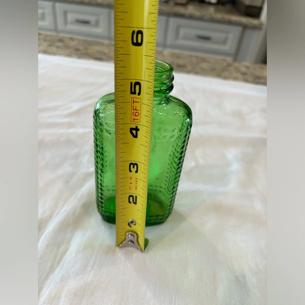 Vintage anchor hocking Emerald‎ Green studied English hobnail bottle.